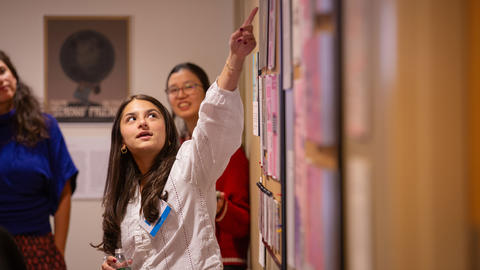 Rania Jones points to her project.