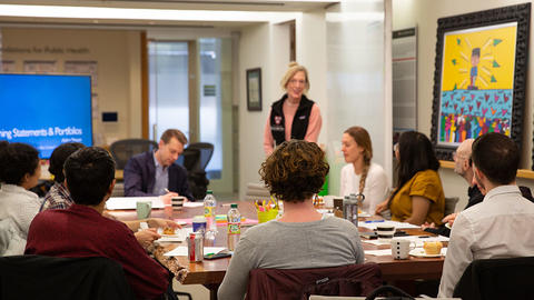 Sue J. Goldie speaking to Teaching Fellows during workshop.