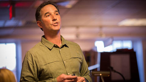 Dean Cardinale speaking at book event.