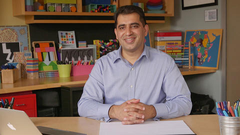 Abdul Tawab Saljuqi sitting in GHELI's studio.