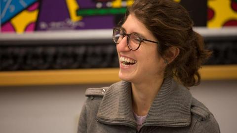 CHDS staff member smiling and laughing.