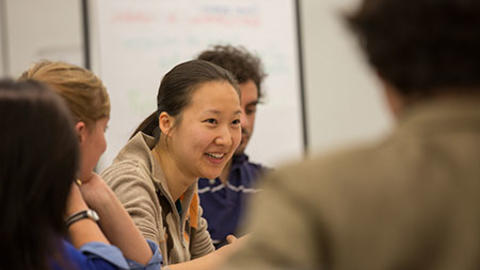 Teaching Fellows in a meeting.