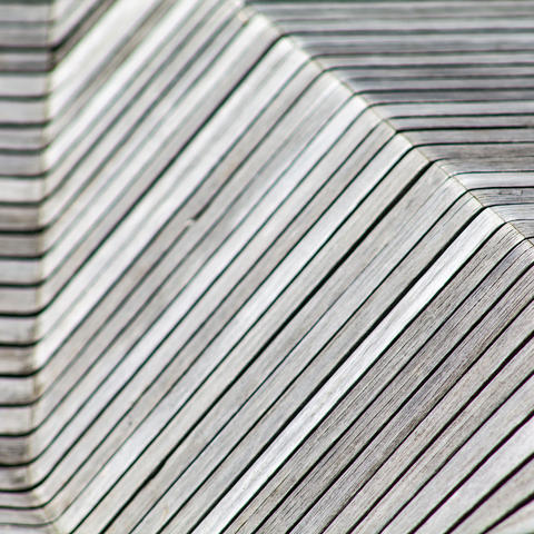 Gray textured wall of Harvard building. 