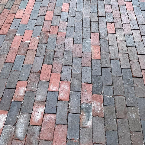 Close-up of brick walkway.