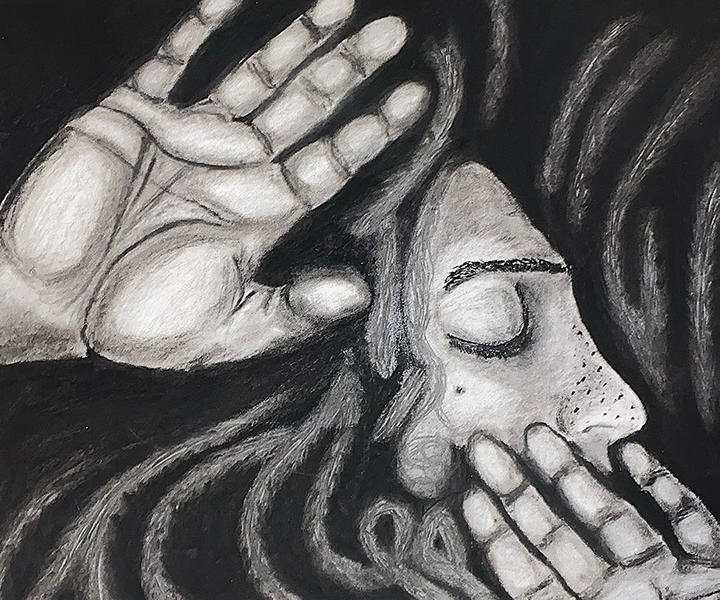 Young woman’s two hands are pressed against a surface whiles she looks away with her eyes closed.