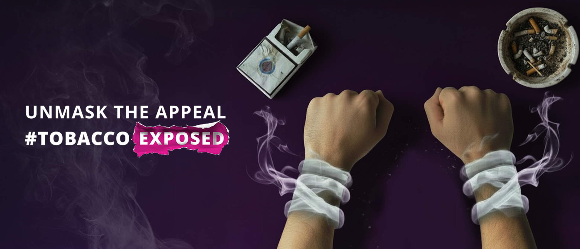 2 hands with smoke around wrists like handcuffs, a pack of cigarettes and an ashtray.